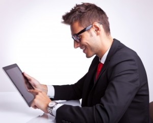 businessman on a handheld device